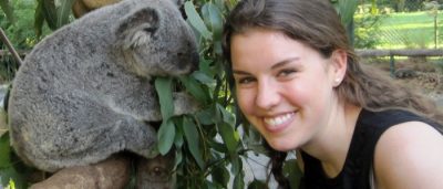 Georgianna Mann posing with a koala